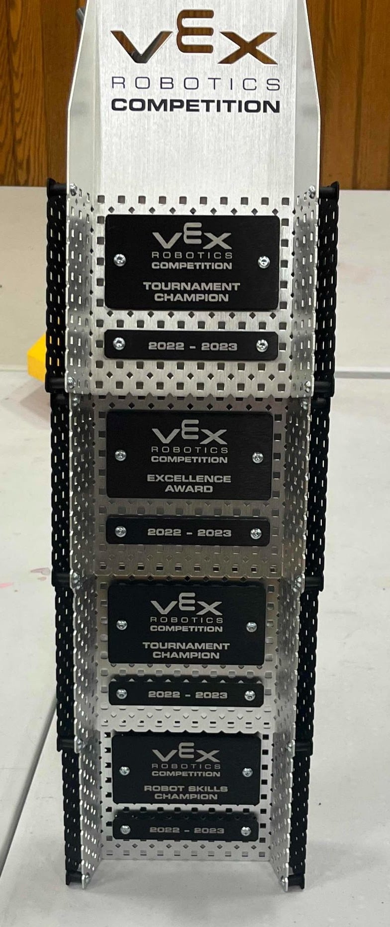 LexVEX with a stack of awards from the Spin Up season