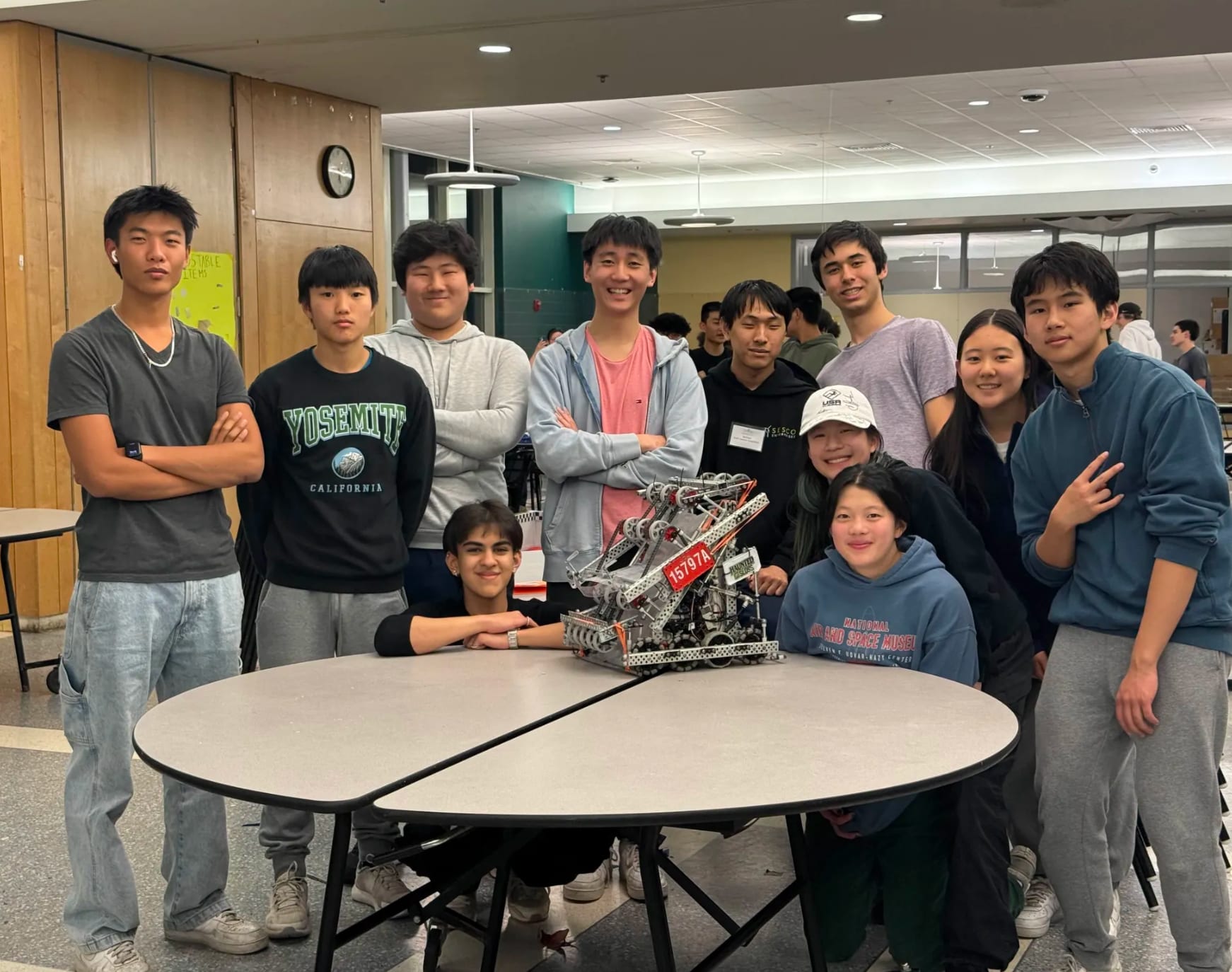 The LexVEX team around the 15797A High Stakes robot at the North Andover tournament